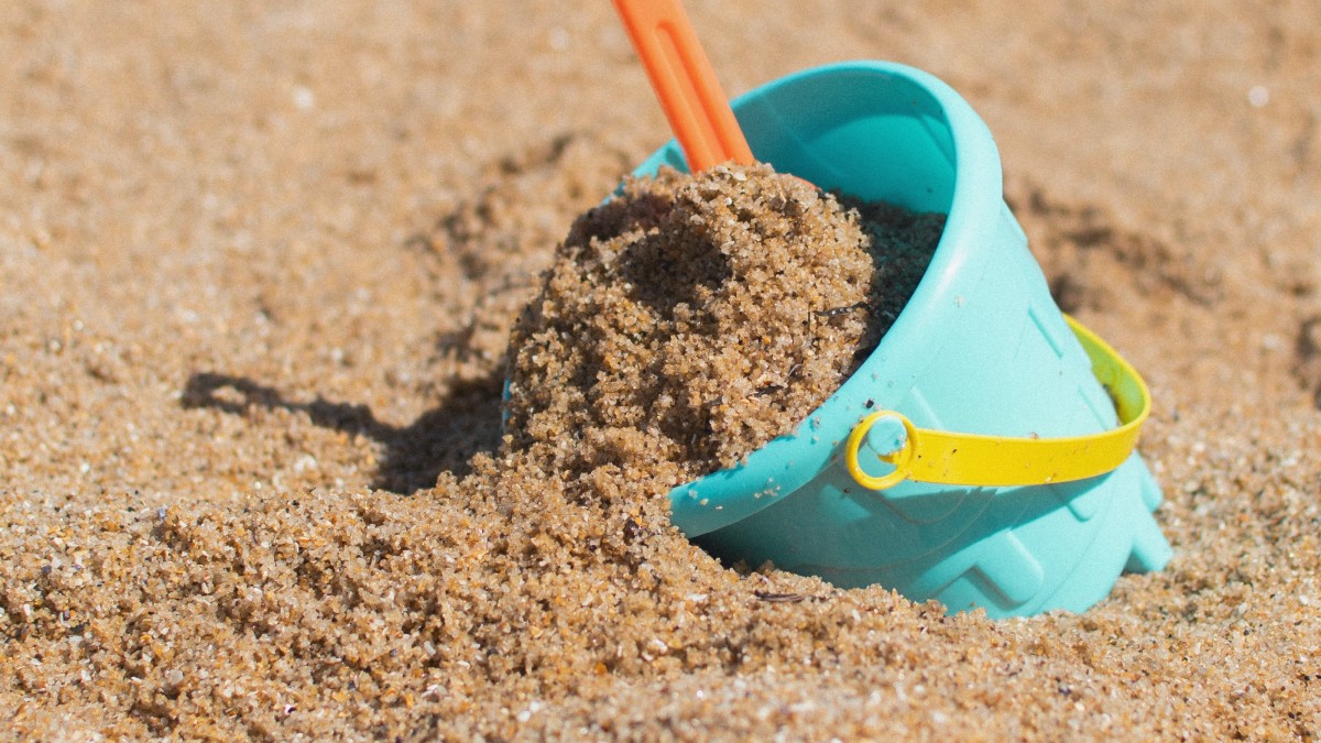 zand spelen strand - Unsplash